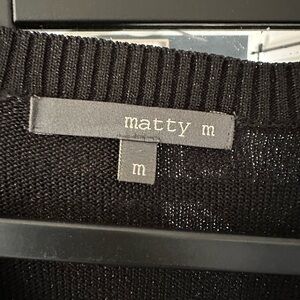 Matty M med black sweater shimmer